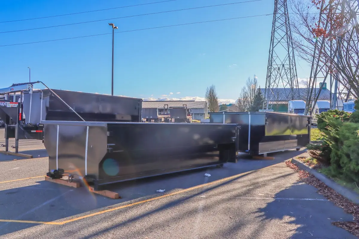 Roll-off dumpster ready for waste disposal at job site for Construction Dumpster Rental in Hollis